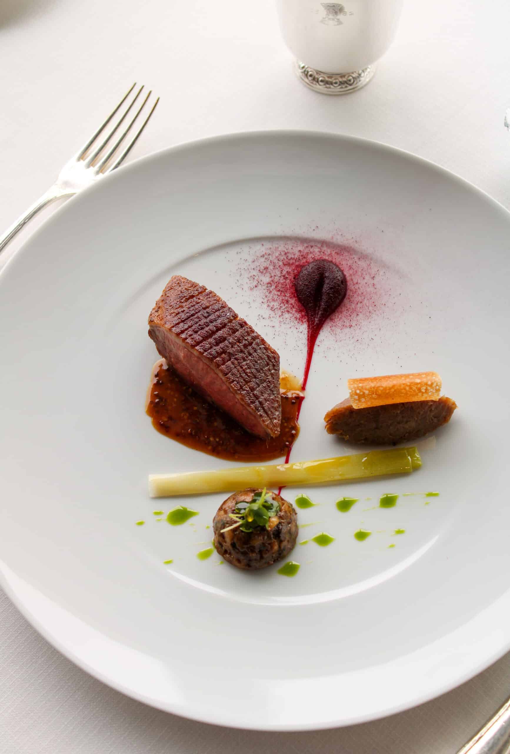 Seasonal duckling, hibiscus powdered fillet, caillette & stewed shallots, whole grain mustard juice